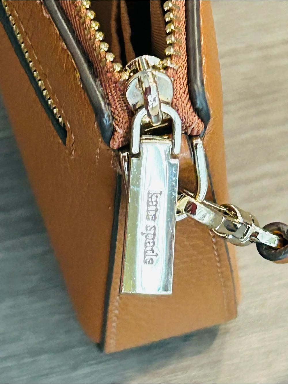 KATE SPADE Pebbled Leather Wristlet/Clutch Bag with Gold Hardware.
